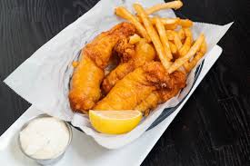 Dini’s By The Sea signature dishes Fish & Chips
Oysters Rockefeller
Dini's House Salad